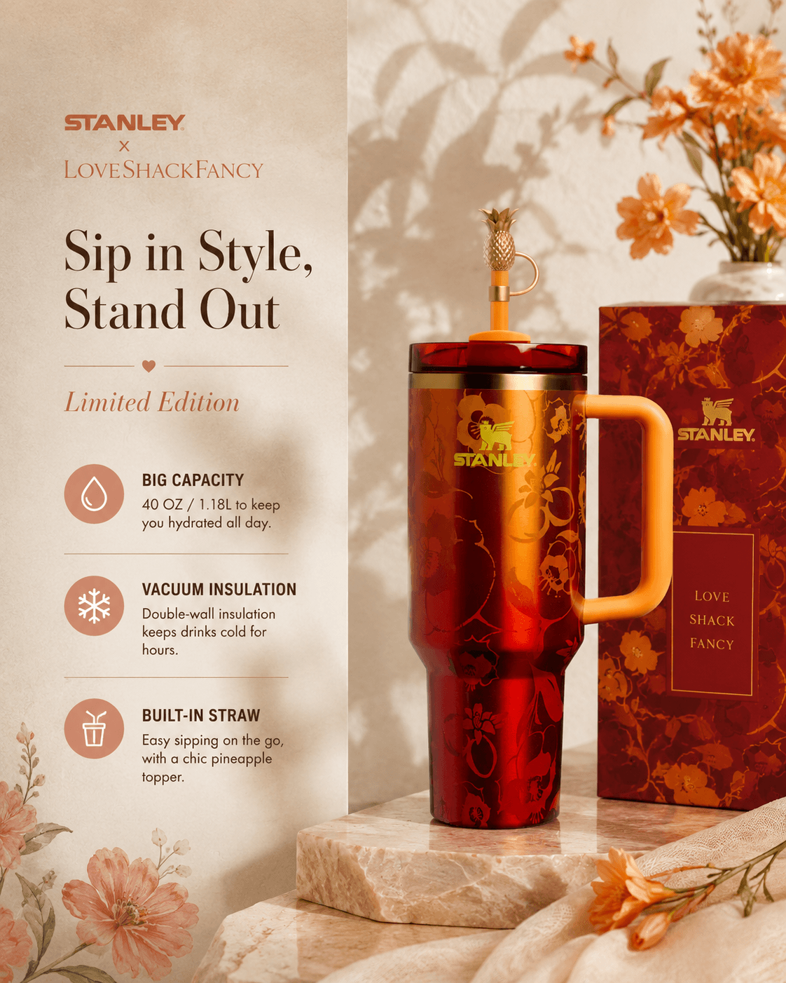 Stanley x Karol G 40 oz Quencher Tumbler in ruby red with floral artwork and pineapple straw topper next to its orange collector box - View 9 | Clistos